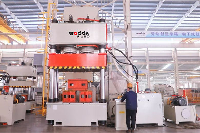 大台(tái)面雙缸(gang)1000噸三梁(liáng)四柱液(ye)壓機